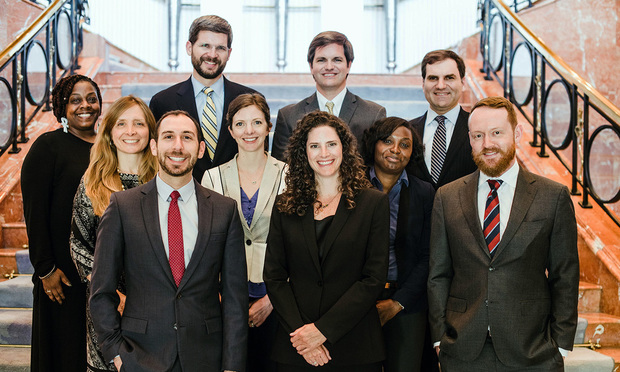 Caplan Cobb Atlanta. (back row, from left) Toni Brown, James Cobb, Will Bishop and Mike Caplan and (front row, from left) Jennifer Cochran, Jarred Klorfein, Julia Stone, Jessica Caleb, Ashley Brown and Brandon Waddell. (Courtesy photo)