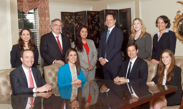 Swift Currie McGhee & Hiers, personal injury defense group (seated, from left) Drew Timmons, Pamela Lee, Terry Brantley and Eleanor Jolley, (back row, from left) Ashley Alfonso, Roger Harris, Nelufar Agharahimi, Lee Clayton, Jennifer Nichols and Melissa Segel. (Photo: John Disney/ALM)