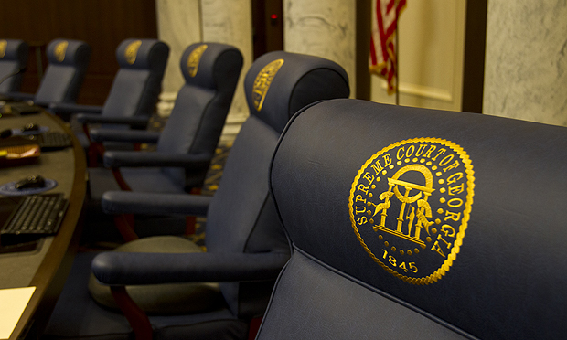 A detail of one of the embroidered chairs for justices in the Supreme Court courtroom. (Photo: John Disney/ALM)
