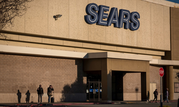 Customers stand outside of a Sears Holdings Corp. store in San Bruno, California, on Dec. 28, 2018. Photo: David Paul Morris/Bloomberg