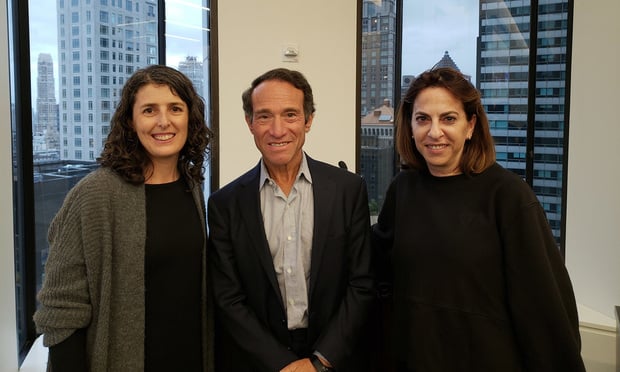 Olga Akselrod, at left, the director of intake and evaluation for the Innocence Project, and two members of the Innocence Project's board, Weil partner Steven Reiss and Skadden partner Vered Rabia, celebrated the elimination of the Innocence Project's application backlog at an event at Weil on Sept. 6, 2019. Courtesy photo.
