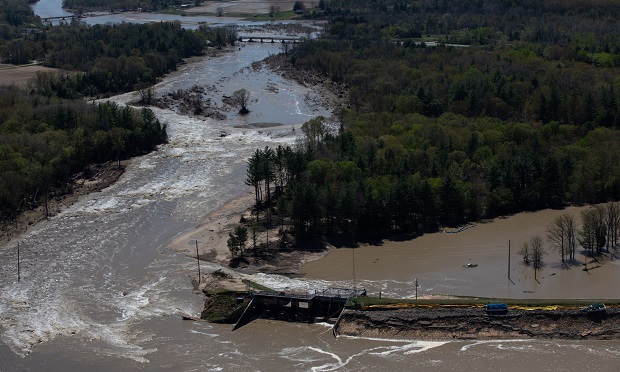 The Edenville dam is seen after breaking in this aerial photograph taken above Midland, Michigan, U.S., on Wednesday, May 20, 2020. President Donald Trump said he's sending federal emergency workers to Midland where dam failures have flooded a Dow Inc. chemical complex and homes in a disaster that may force the evacuation of more than 10,000 people. (Photo: Bloomberg)