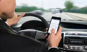 Work Pressures Might be Propelling Distracted Driving Rates
