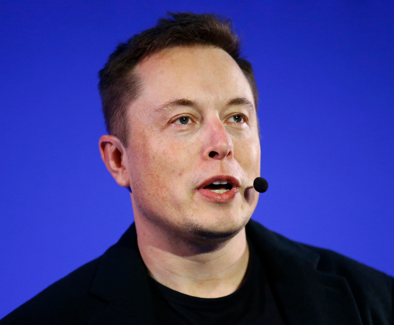 Portrait of Elon Musk wearing a microphone