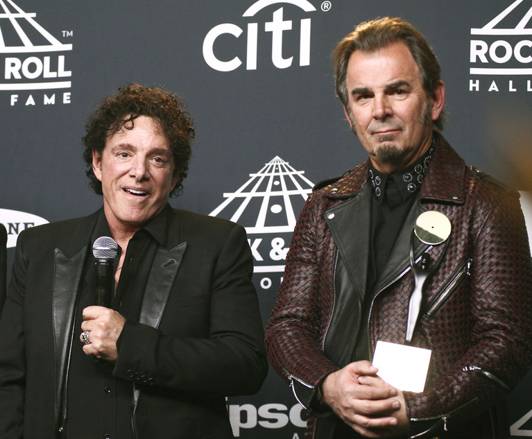 From left, Neal Schon and Jonathan Cain of the band Journey pose in the press room at the 2017 Rock and Roll Hall of Fame induction ceremony at the Barclays Center on Friday, April 7, 2017, in New York. Photo: Andy Kropa/Invision/AP