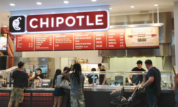 Chipotle Workers Sue for Overtime Testing Scope of Obama Era Rule