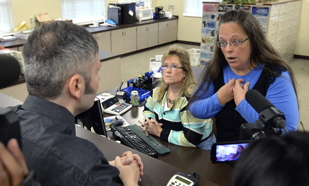 Defiant Ky Clerk Ordered to Court in Same Sex Marriage Standoff